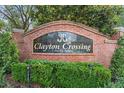 Elegant brick sign for Clayton Crossing community with lush landscaping and traditional design details at 2829 Shady Willow Ln, Oviedo, FL 32765