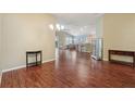 Spacious dining area with hardwood flooring, ample natural light, and an open layout at 3198 Abana Path, The Villages, FL 32163