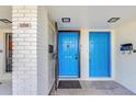 Inviting covered entrance with a bright blue front door at 1210 Maury Rd # 3, Orlando, FL 32804