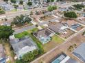 Residential area featuring well-kept homes and streets, complete with community pool and local traffic at 7760 Indian Ridge N Trl, Kissimmee, FL 34747