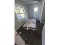 Interior shot of a bedroom, showing the room's dimensions and window placement at 1620 Grand St, Orlando, FL 32805
