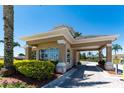 Welcoming entrance gate to the community with well-maintained landscaping and clear signage at 2304 Silver Palm Dr # 304, Kissimmee, FL 34747