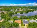 Aerial view of a residential community surrounding a lake, showcasing the natural landscape at 1846 Branchwater Trl, Orlando, FL 32825