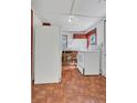 Bright eat-in kitchen with white appliances and wooden cabinets at 2045 South St, Oviedo, FL 32765