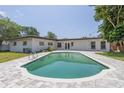 Relaxing backyard with a refreshing pool and spacious patio area, perfect for outdoor enjoyment at 2171 Chippewa Trl, Maitland, FL 32751