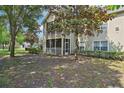 This condo boasts a screened lanai and lush lawn at 3721 S Lake Orlando Pkwy # 05, Orlando, FL 32808