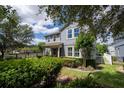 Charming two-story home with manicured landscaping and a welcoming facade at 6543 Orange Cream Aly, Winter Garden, FL 34787