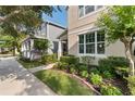 Beautiful home exterior with well-maintained lawn, landscaped beds, and a charming front porch at 976 Eagle Bay St, Winter Springs, FL 32708