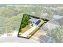 Stunning aerial view showcasing the home and its surroundings in a beautifully shaded perspective at 1324 Saddleridge Dr, Orlando, FL 32835