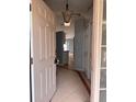 Inviting entryway with ceramic tiled floors and a clear view into the home at 1603 Emily Ct, Kissimmee, FL 34744
