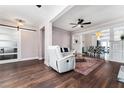 Cozy living room featuring an open floor plan, stylish furnishings, and hardwood floors at 1625 S Eola Dr, Orlando, FL 32806