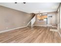 Open floorplan featuring modern floors and a staircase to the second floor at 2110 Stockton Dr, Sanford, FL 32771
