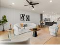Bright living room with recessed lighting, a modern ceiling fan, and luxury vinyl plank flooring at 2949 Clever Ln, Winter Park, FL 32792