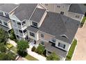 Charming townhome with multiple balconies, neat landscaping, and a welcoming entrance at 415 Old Farm Ln, Winter Springs, FL 32708