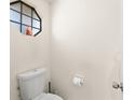 Clean, well-lit powder room with a unique octagonal window at 609 Northbridge Dr, Altamonte Springs, FL 32714
