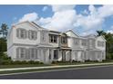 New townhomes feature neutral siding, dark shutters, covered porches, and manicured landscaping at 15345 Burgtheater Dr, Winter Garden, FL 34787