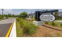 Lake Meadow Landing community sign surrounded by lush landscaping at 1915 Terrapin Rd, Ocoee, FL 34761