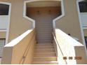 Stairway leading to the units featuring a decorative facade at 3166 S Semoran Blvd # 1007, Orlando, FL 32822