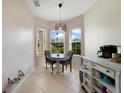 Cozy breakfast nook illuminated by natural light from three large windows, perfect for casual dining at 4558 Redmond Pl, Sanford, FL 32771