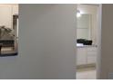 Bathroom features a vanity with dual sinks, a large mirror, and ample counter space at 581 Brantley Terrace Way # 302, Altamonte Springs, FL 32714