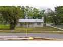 Charming single-story home featuring a fenced yard and a sidewalk at 715 Ballard St, Altamonte Springs, FL 32701