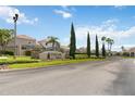 Welcome to Tuscan Hills, a community with lush landscaping and a secure, gated entrance at 822 Brunello Dr, Davenport, FL 33897