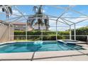 Relaxing screened-in pool and spa area perfect for enjoying the outdoors in privacy at 822 Brunello Dr, Davenport, FL 33897