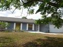 Exterior view of a single-story house featuring well-maintained front lawn at 130 Krider Rd, Sanford, FL 32773
