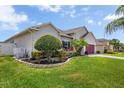 Beautiful single-Gathering home with a well-manicured lawn and mature landscaping at 2518 Hayden Valley St, Apopka, FL 32703