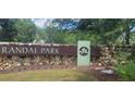Attractive Randal Park community sign with stone base and manicured landscaping at 10658 Bannan St, Orlando, FL 32832
