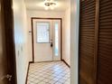 Welcoming foyer with tiled floor, closet, and a glass-paneled front door for plenty of light at 3152 Clewiston St, Deltona, FL 32738