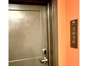 Apartment door with visible unit number signage on hallway wall at 14501 Grove Resort Ave # 3636, Winter Garden, FL 34787