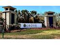 Well-maintained entrance sign for The Grove Resort & Waterpark at 14501 Grove Resort Ave # 3636, Winter Garden, FL 34787