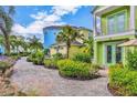 Well-maintained gravel backyard with lush greenery, perfect for outdoor entertaining and relaxation with room to roam at 3013 Latitude Ln, Kissimmee, FL 34747