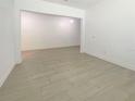 This versatile empty room features light tile flooring, neutral walls, and ample natural light at 4116 Se 9Th Ave, Ocala, FL 34480