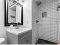 Updated bathroom featuring modern fixtures, subway tile, and a convenient shower niche at 1094 Henry Balch Dr, Orlando, FL 32810