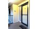 Front door entrance with a glass door and a unit number 3D at 130 Jasmine Woods Ct # 3D, Deltona, FL 32725