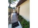 Pathway to the home showcases well-maintained greenery and a welcoming entrance mat at 1880 N Crystal Lake Dr # 3, Lakeland, FL 33801
