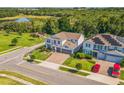Aerial view of a home surrounded by mature trees and manicured lawns, offering a sense of privacy and tranquility at 2539 Auburn Ridge Dr, Apopka, FL 32712