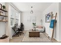 Bright office space with a large window, modern desk, and neutral decor at 5458 Carrara Ct, St Cloud, FL 34771