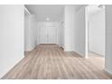 Spacious living room featuring wood-look flooring and a bright, open feel at 6042 Brookhill Cir, Orlando, FL 32810