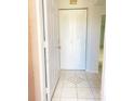 Tiled foyer with closet provides an inviting entrance to this cozy home at 2468 Citrus Club Ln # 502, Orlando, FL 32839