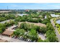 Aerial view showcasing the community's layout, landscaping, and proximity to surrounding areas at 7511 Seurat St # 10207, Orlando, FL 32819
