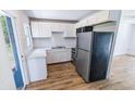 Bright kitchen featuring stainless steel appliances, ample cabinetry, and modern countertop at 1507 Sw 4Th St, Ocala, FL 34471
