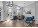 Bright living room features high ceilings, clerestory windows, and contemporary furnishings at 2643 University Acres Dr, Orlando, FL 32817