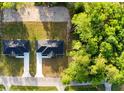 Overhead shot of two new homes, showing the proximity and lot layouts in a lush, green neighborhood at 4919 Nw 61St Ct, Ocala, FL 34482