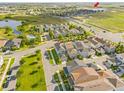 An aerial view showcases the neighborhood, nearby roads, and proximity to community amenities at 15358 Arcadia Bluff Loop, Winter Garden, FL 34787