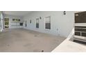 Large carport with ample space, with direct access to the main home at 1548 Challenger Ave, Davenport, FL 33897