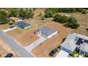 Expansive aerial view of home showcasing new lawn and surrounding properties, highlighting the neighborhood layout at 16655 Sw 43Dr Terrrace Rd, Ocala, FL 34473