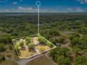 Expansive aerial view showcasing the property's generous land and serene surroundings at 2550 Barren Oak Ct, Deland, FL 32720